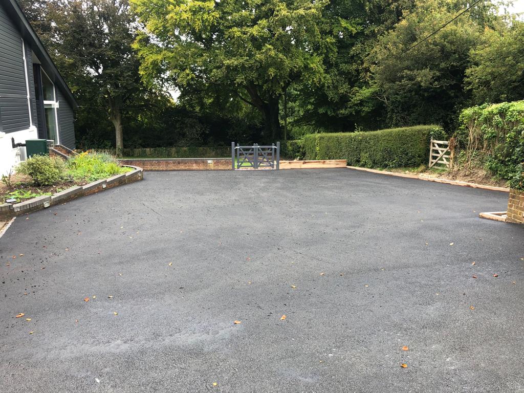 This is a photo of a bitumen driveway which is in the process of being installed by Stanthorpe Asphalt & Bitumen Surfacing
