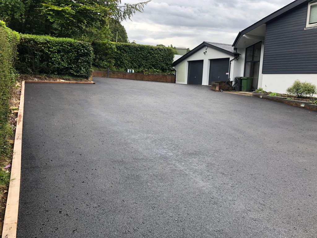 This is a photo of a asphalt driveway which is in the process of being installed by Stanthorpe Asphalt & Bitumen Surfacing